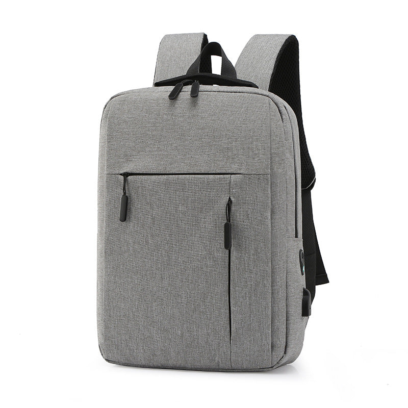 A stylish nylon laptop backpack designed for business and leisure, featuring adjustable shoulder straps and spacious compartments.