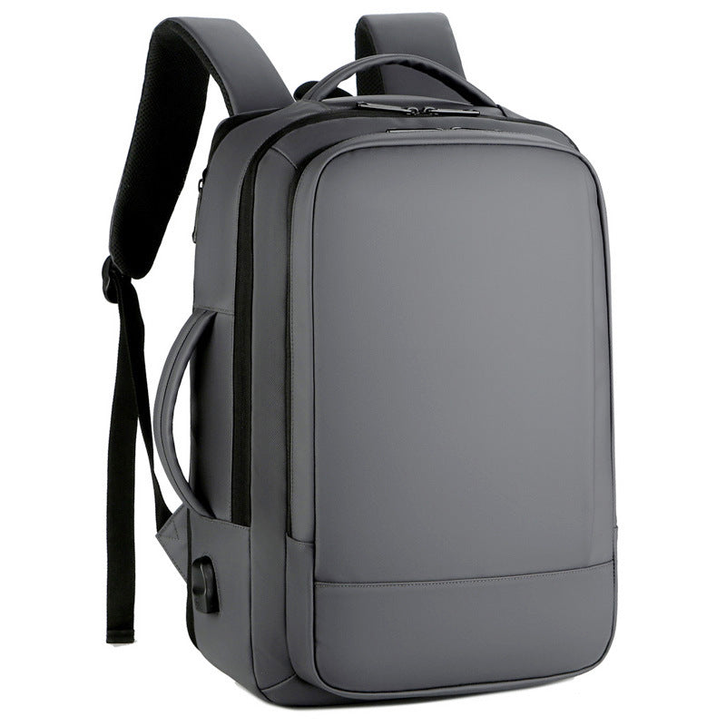 Large Capacity Multifunctional Waterproof Fashion Backpack in solid color, showcasing multiple pockets and USB charging feature.