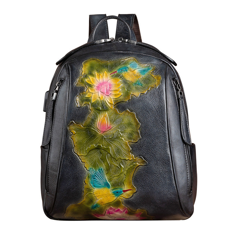 Large Capacity Three Dimensional Embossed Vintage Backpack made from premium cattle skin with floral design.