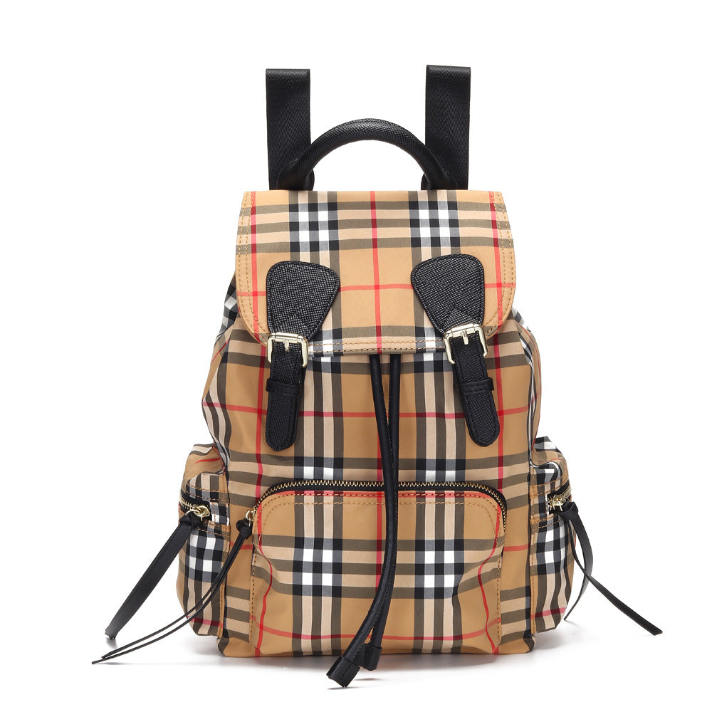 Large Oxford cloth backpack for women featuring a stylish design, durable material, and soft handle, perfect for travel and daily use.