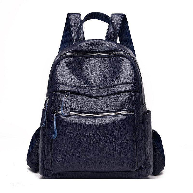 Large-capacity casual female fashionable backpack made of PU leather, featuring a stylish design with double root shoulder straps and multiple internal pockets.