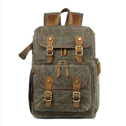 Leisure Canvas Photography Camera Backpack made of durable polyester and batik canvas, featuring multiple compartments for camera gear and a stylish design.