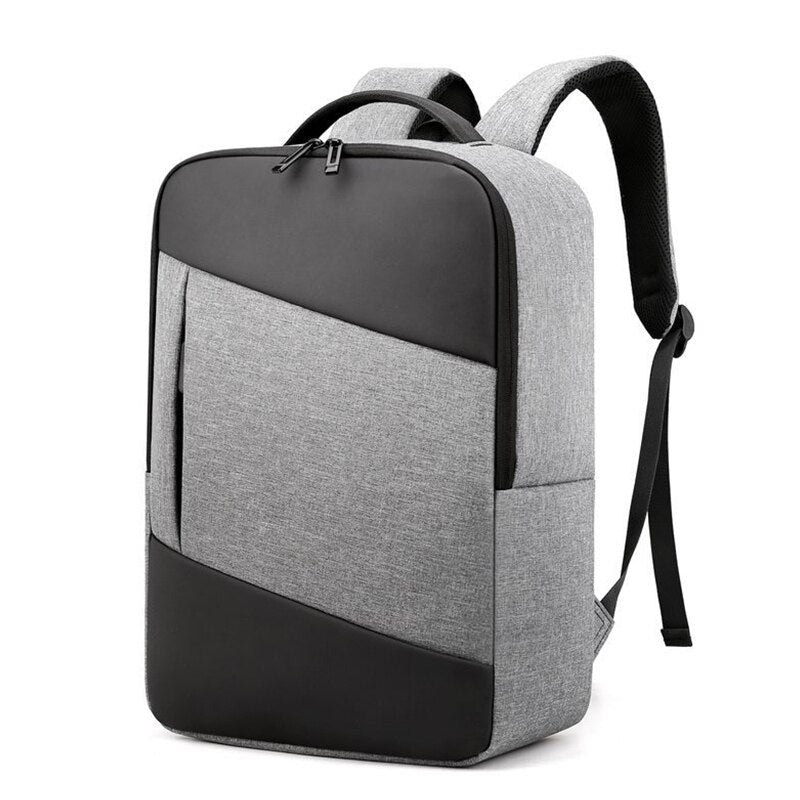 Man Backpack Multifunction USB Charging Bag in black nylon, featuring USB charging port and spacious compartments for laptops and essentials.