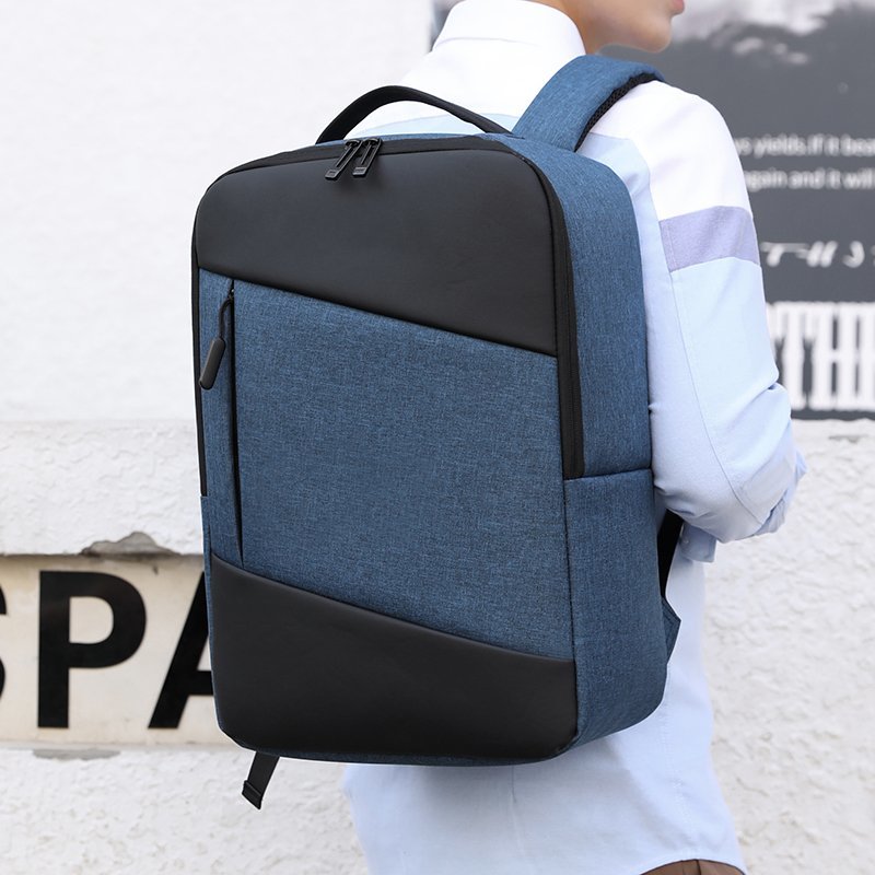 Man Backpack Multifunction USB Charging Bag in black nylon, featuring USB charging port and spacious compartments for laptops and essentials.