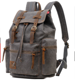 Men's and Women's Canvas Large Capacity Backpack featuring water-resistant PU leather, spacious design, and stylish appearance.