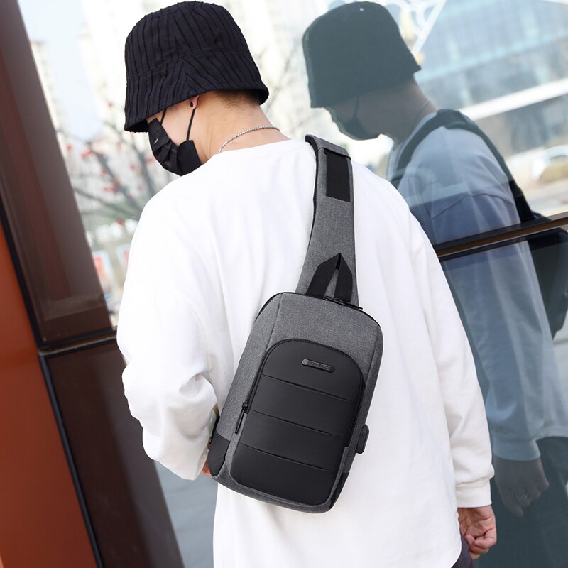 Men's Backpack Business Crossbody Bag made of durable nylon, featuring multiple pockets and a zipper closure, ideal for versatile use.