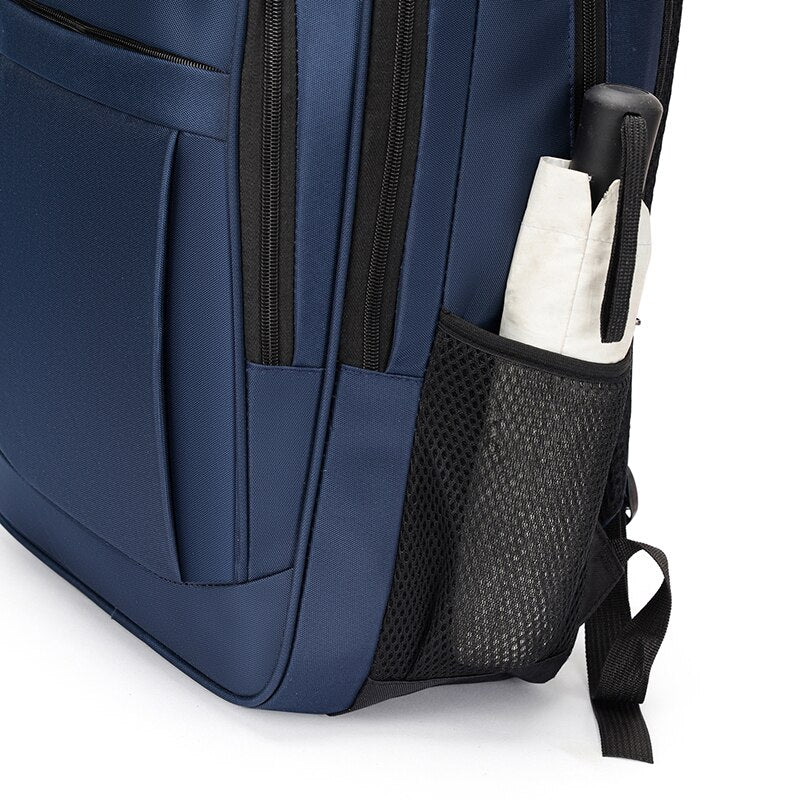 Men's multifunctional nylon backpack designed for carrying laptops up to 15.6 inches, featuring multiple pockets and a comfortable strap system.