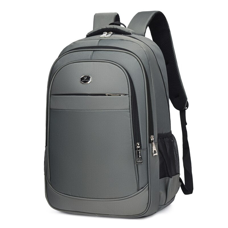 Men's multifunctional waterproof business backpack made of Oxford material, featuring multiple pockets and a stylish design.