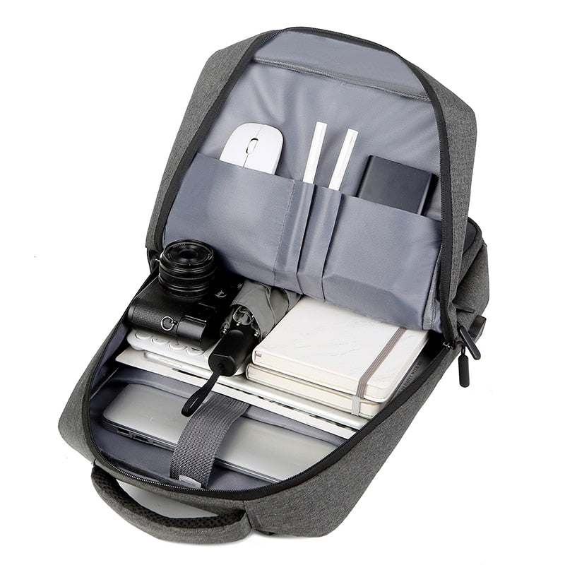 Men's multifunctional waterproof nylon backpack with adjustable straps and multiple compartments, ideal for daily use and outdoor activities.