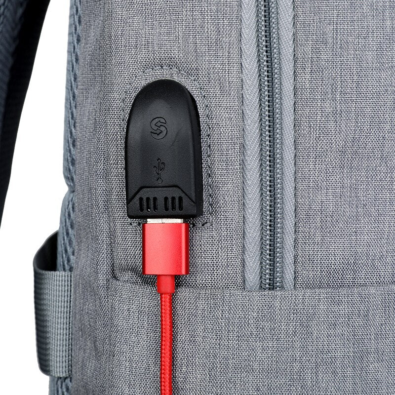 Men's waterproof nylon backpack with USB charging port and reflective stripe, featuring adjustable straps and multiple pockets.