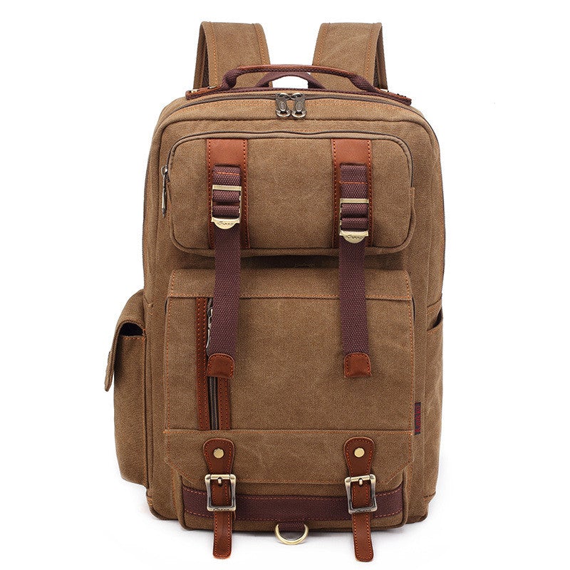 Men's canvas travel backpack in a stylish design, featuring multiple pockets and adjustable straps, perfect for all occasions.