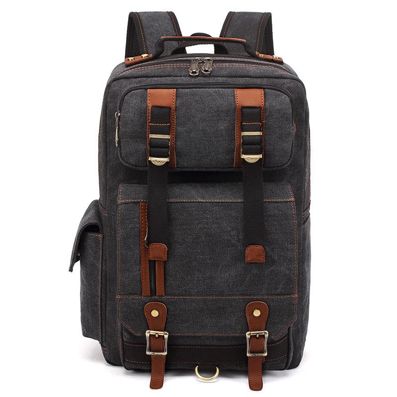 Men's canvas travel backpack in a stylish design, featuring multiple pockets and adjustable straps, perfect for all occasions.