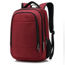 Men's large capacity solid color computer backpack made from waterproof Oxford material, featuring padded straps and spacious compartments.