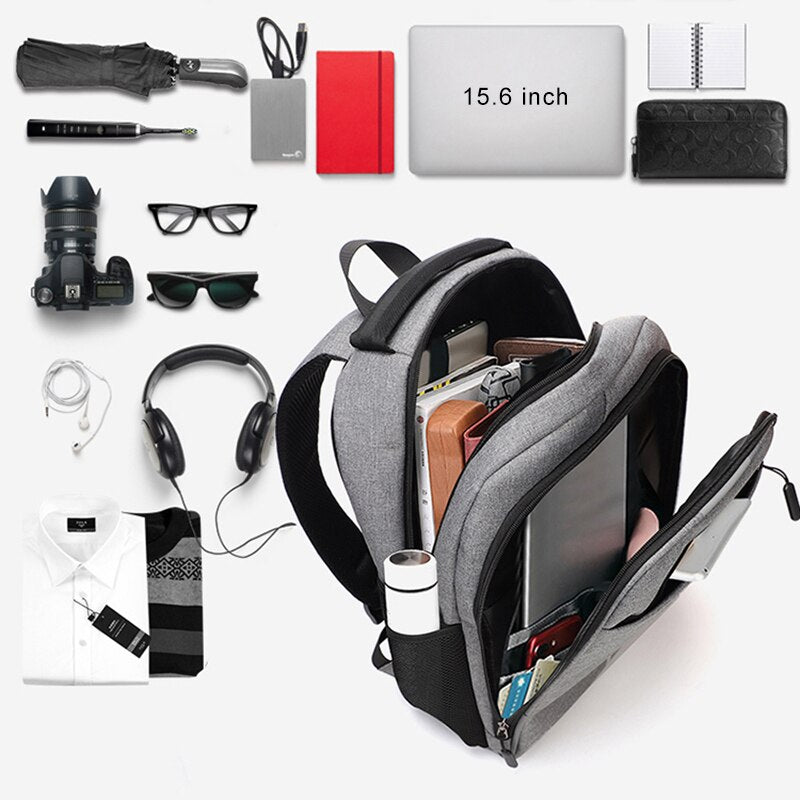 Mens Multifunctional Business Casual Rucksack with USB charging port, showcasing its sleek design and multiple pockets.