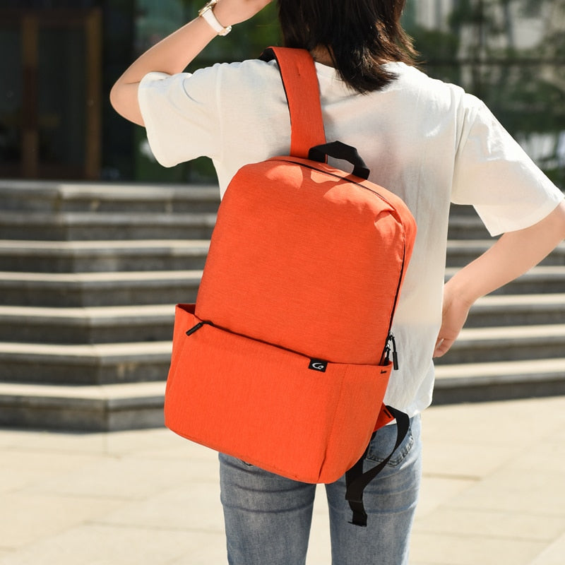 Mens Multifunctional Travel Rucksack in solid pattern, showcasing durable Oxford material and multiple pockets for organization.