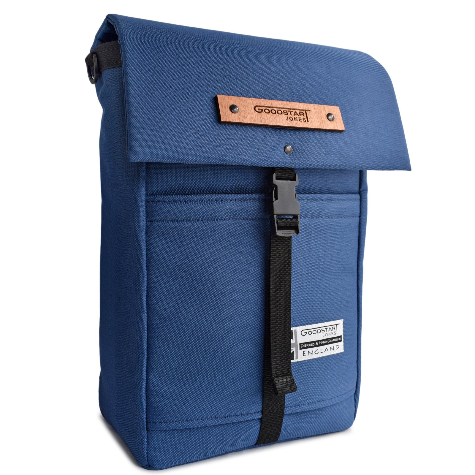 MERCHANT Backpack in Navy Blue showcasing its roll-top design and stylish appearance.