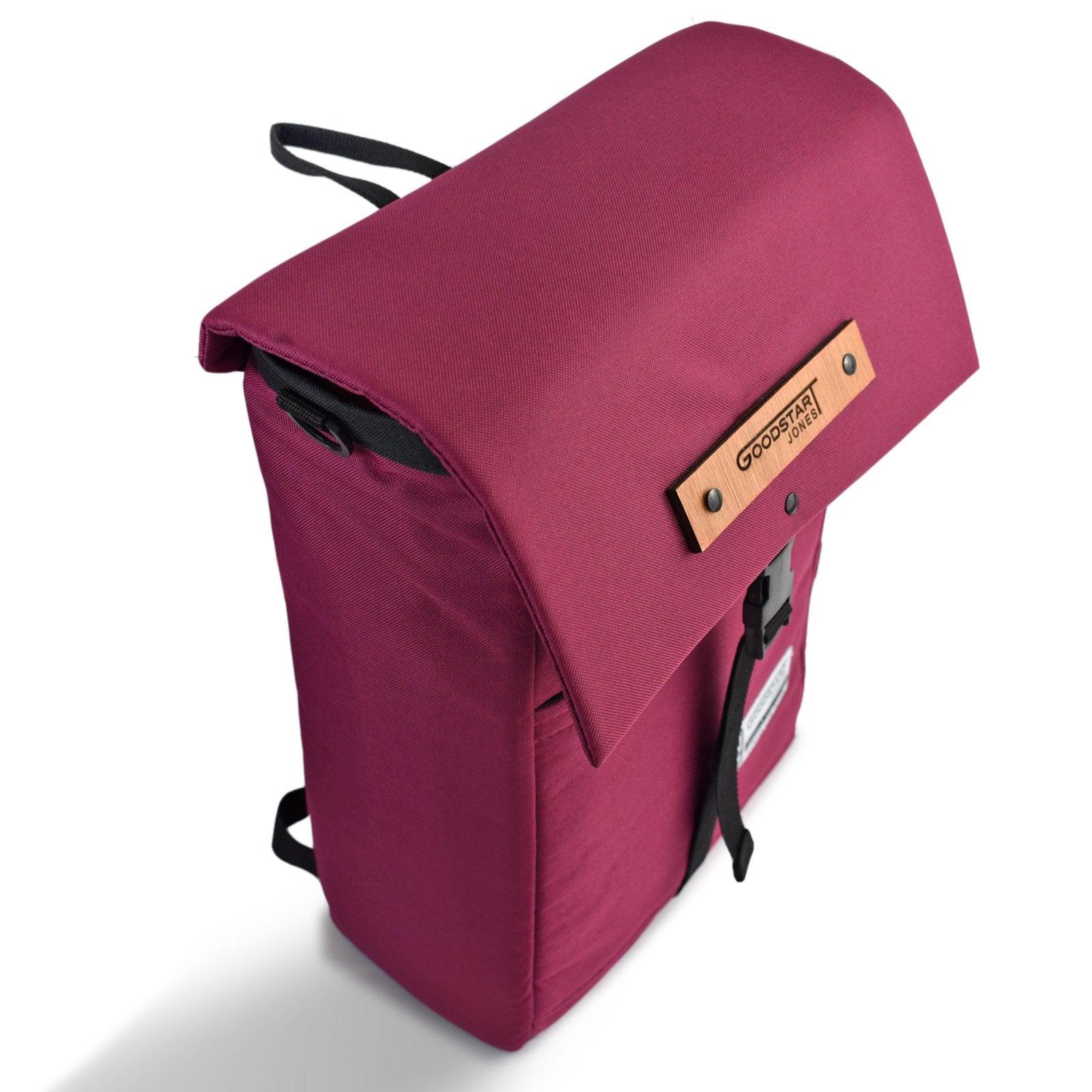 MERCHANT Backpack in Wine Red showcasing its stylish roll-top design and durable materials.