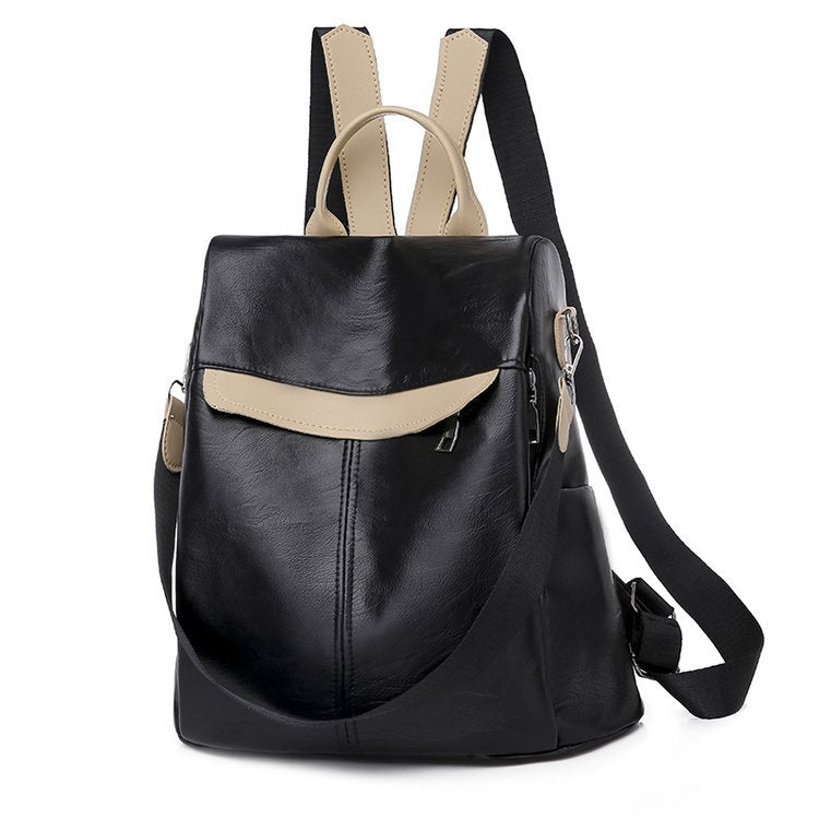 A stylish women's multifunctional anti-theft backpack made of PU leather, featuring multiple pockets and a secure zipper closure.