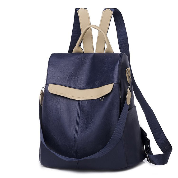 A stylish women's multifunctional anti-theft backpack made of PU leather, featuring multiple pockets and a secure zipper closure.