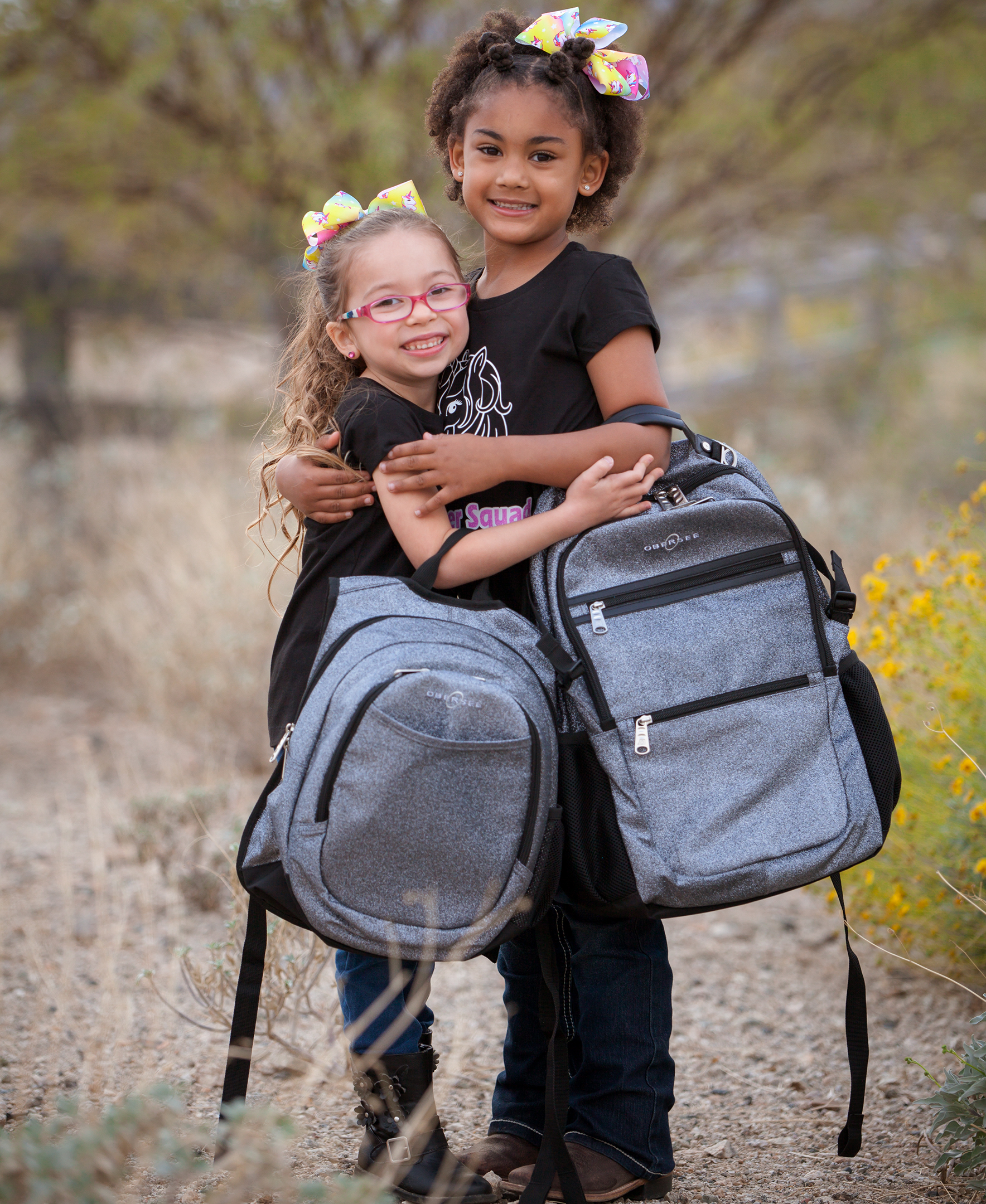 Obersee Mini Preschool Backpack for Girls in vibrant sparkle design, featuring insulated cooler pocket and padded straps, ideal for toddlers.