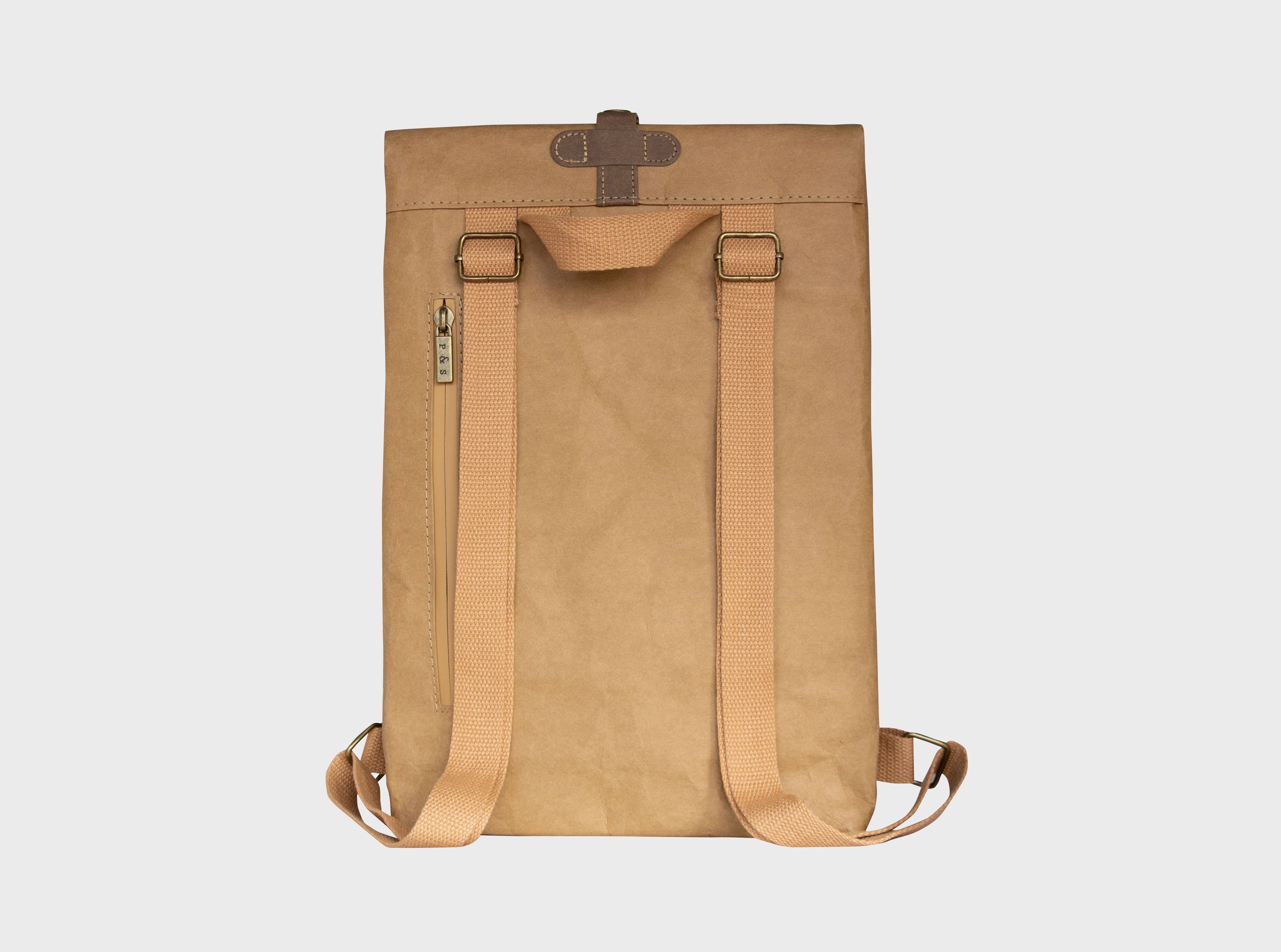 Oak Mini Bundle featuring a durable Kraft paper backpack and travel pouch, showcasing their water-resistant design and practical compartments.