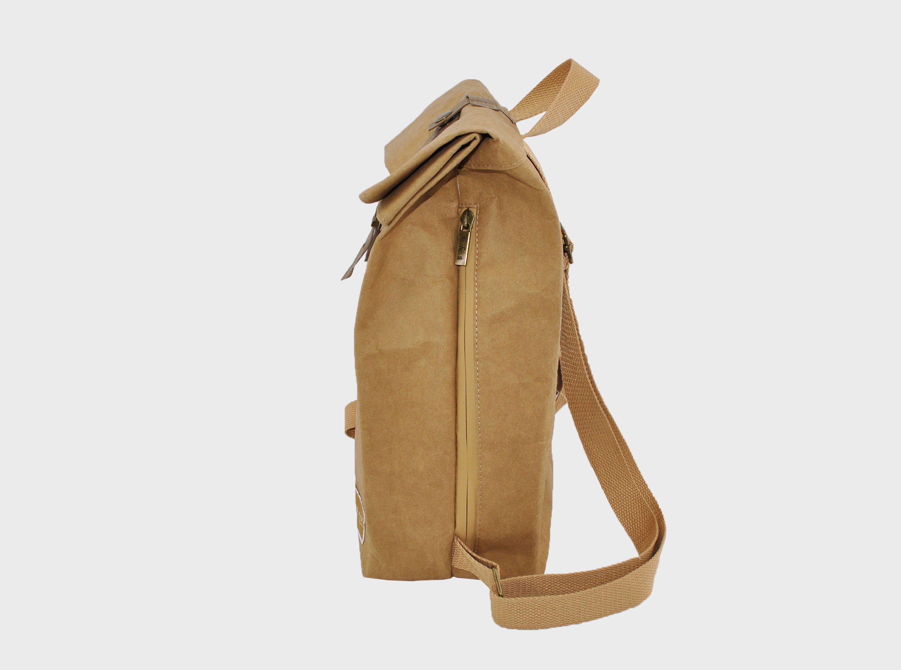 Oak Mini Bundle featuring a durable Kraft paper backpack and travel pouch, showcasing their water-resistant design and practical compartments.