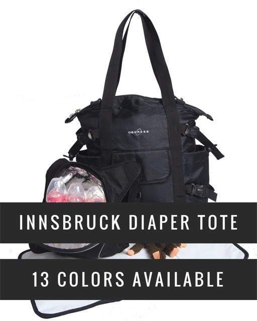 Obersee Innsbruck Tote Diaper Bag in black with detachable cooler, showcasing multiple pockets and a spacious interior for baby essentials.