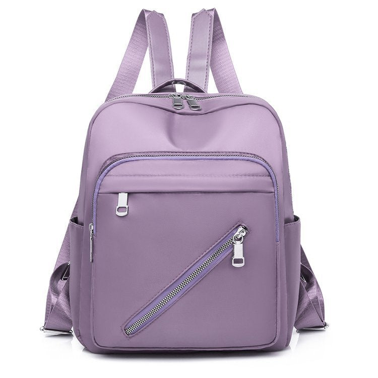 Oxford Cloth Women's Canvas Fashion Simple Backpack in solid color, featuring double shoulder straps and a soft handle.