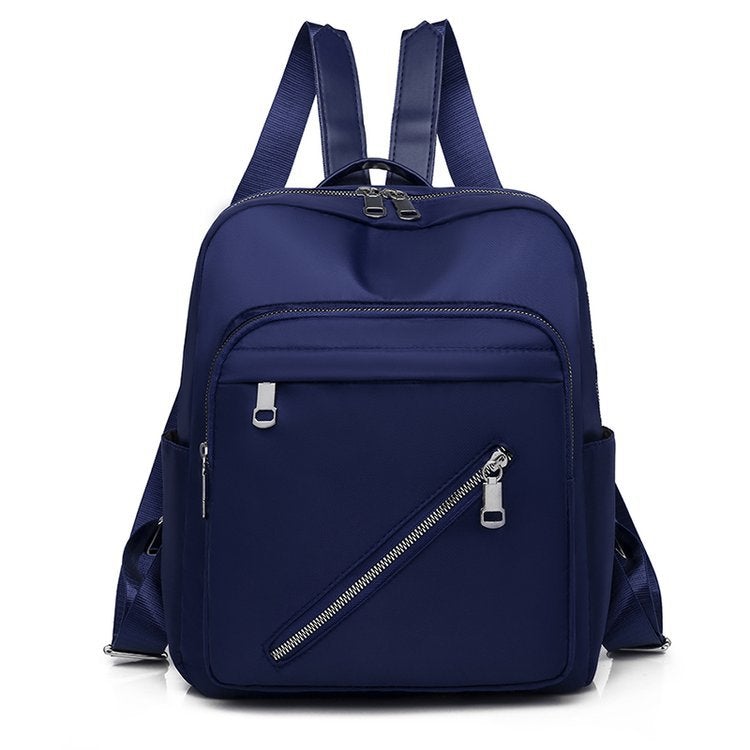 Oxford Cloth Women's Canvas Fashion Simple Backpack in solid color, featuring double shoulder straps and a soft handle.