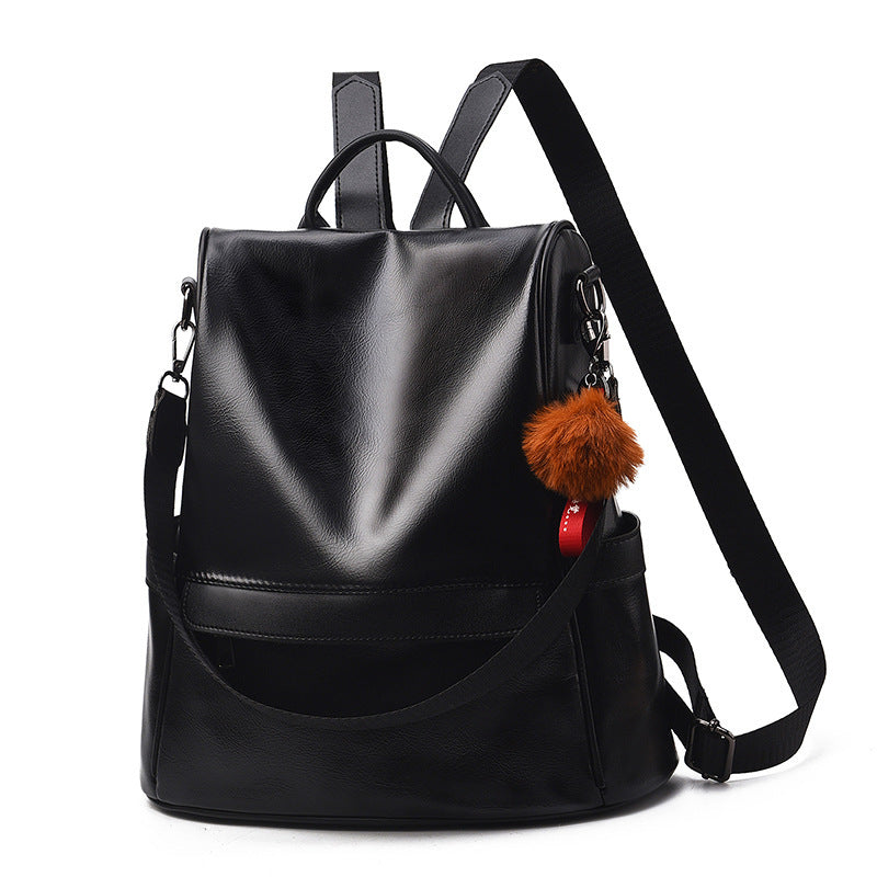 Pure Color Female Backpack featuring a toy ball, made from durable PU material with a stylish design and multiple pockets.