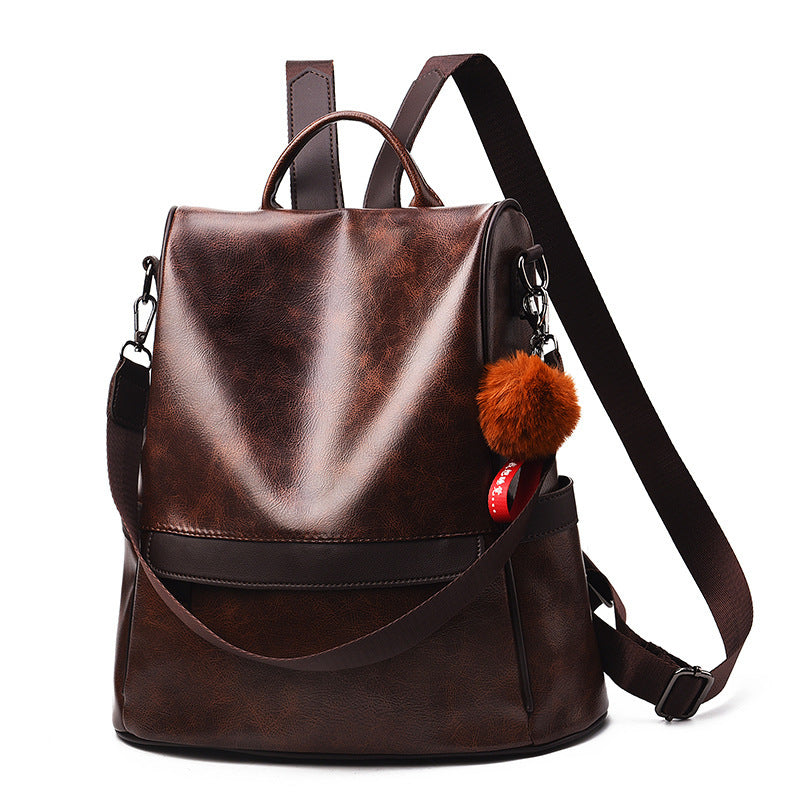 Pure Color Female Backpack featuring a toy ball, made from durable PU material with a stylish design and multiple pockets.