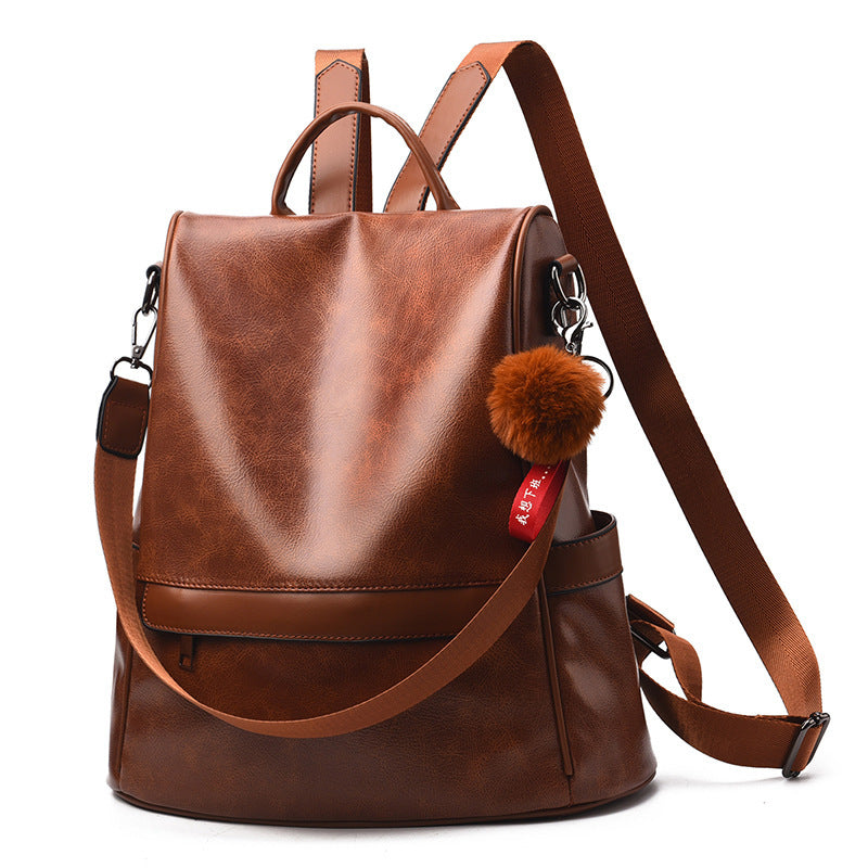 Pure Color Female Backpack featuring a toy ball, made from durable PU material with a stylish design and multiple pockets.