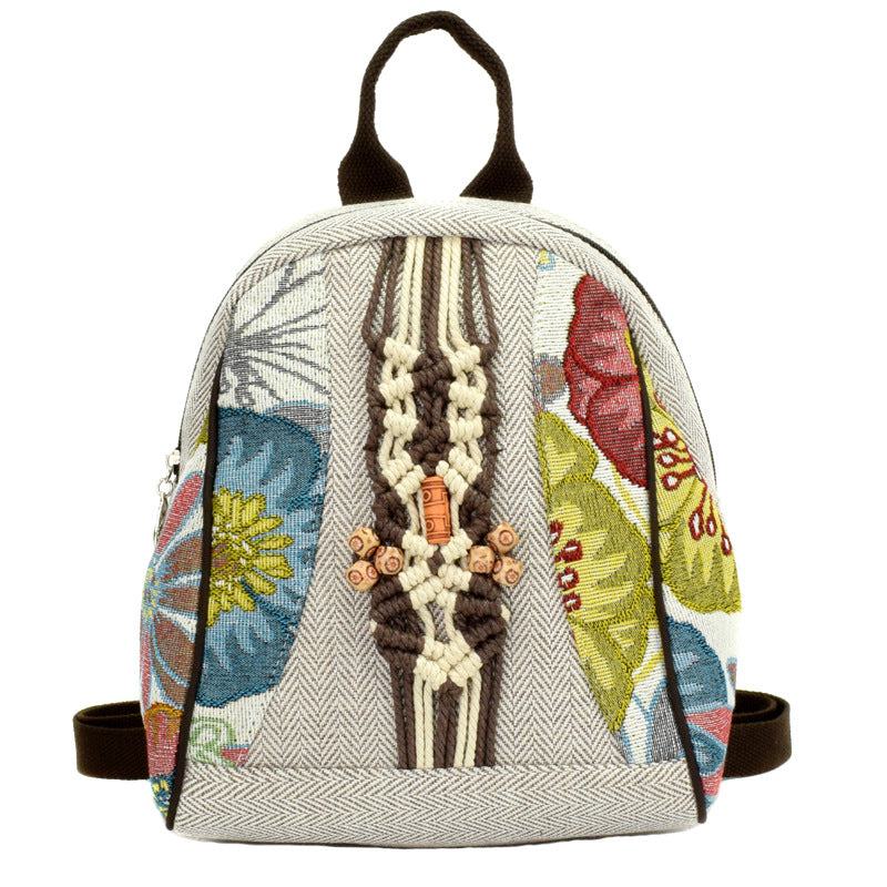 A stylish retro woven backpack for women made of cotton and linen, featuring a shell shape and multiple pockets.