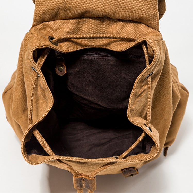 A stylish Simple Leisure Large Capacity Canvas Backpack in a casual design, featuring multiple pockets and adjustable straps, perfect for everyday use.