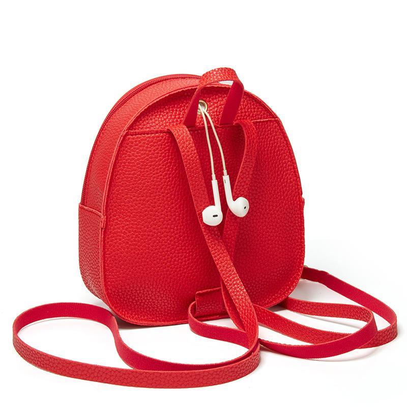 Solid Color Fashion Small Backpack for Women in PU material, featuring a zipper opening and compact design, ideal for daily use.