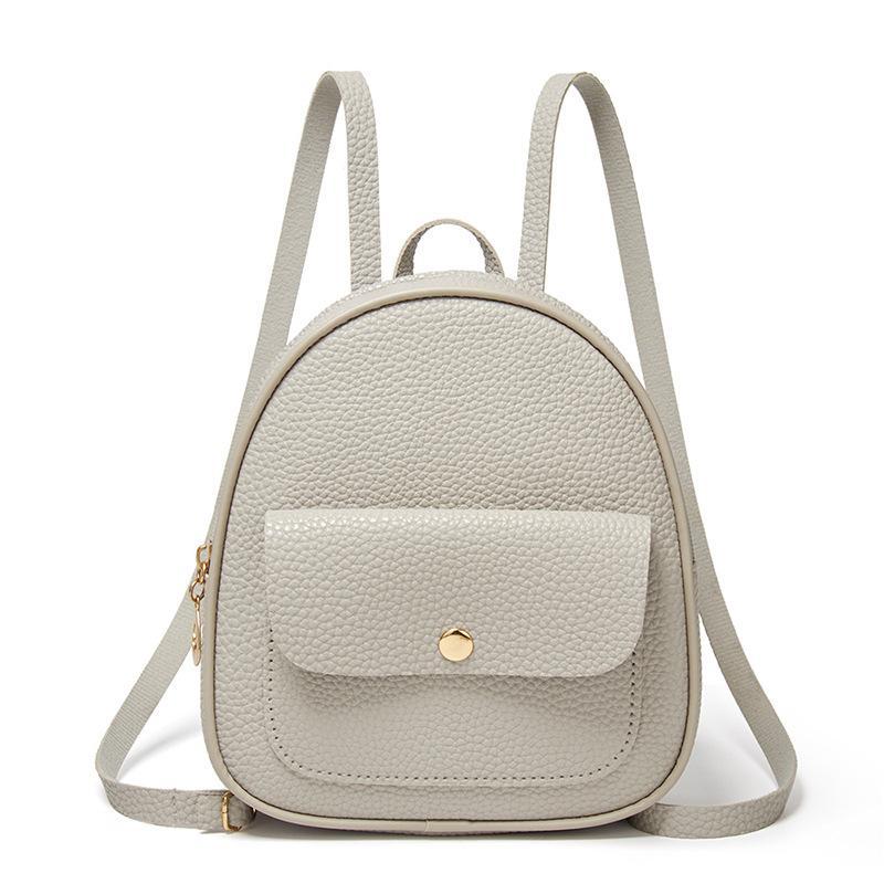 Solid Color Fashion Small Backpack for Women in PU material, featuring a zipper opening and compact design, ideal for daily use.