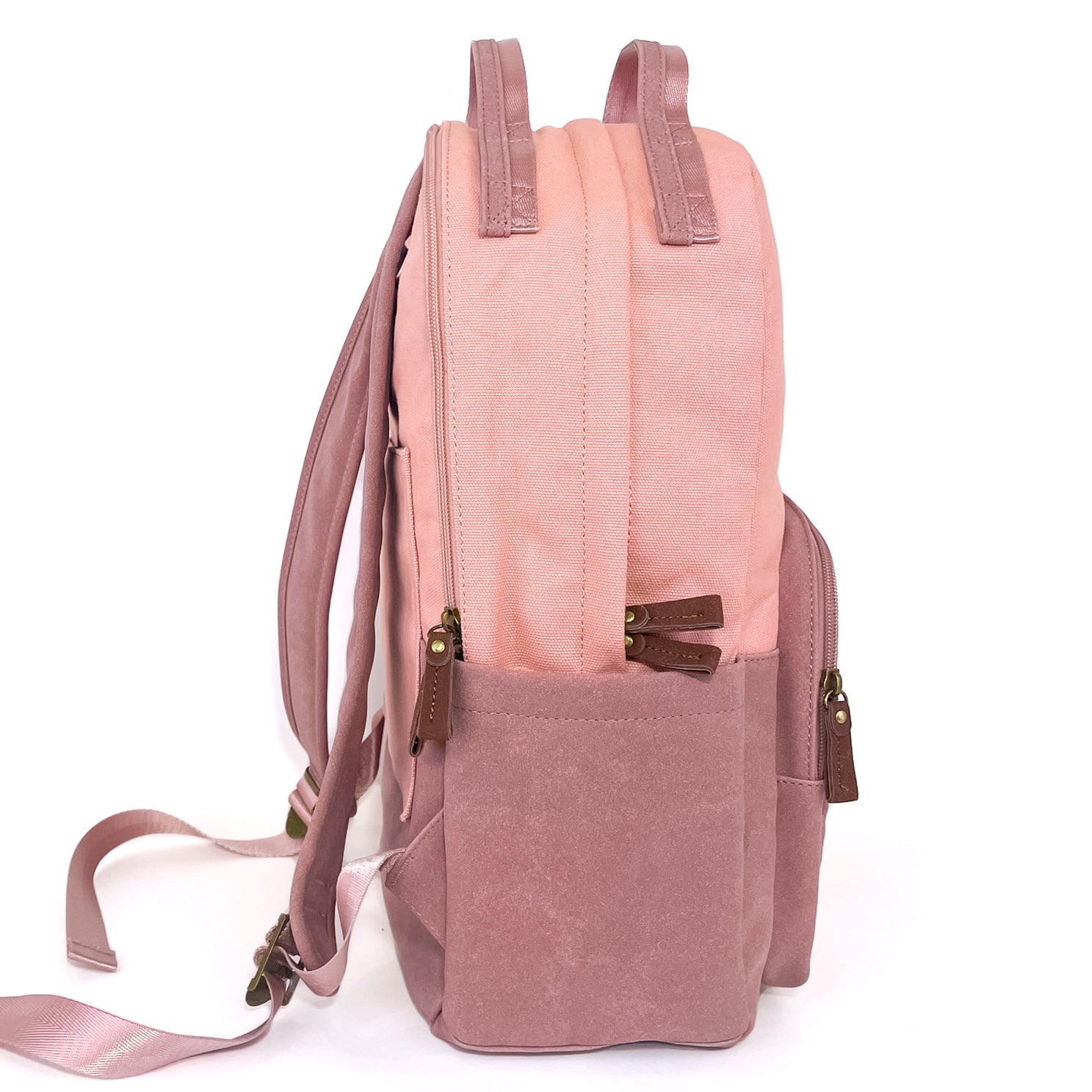 Stylish pink backpack with multiple pockets and a sleek design, featuring a secret back pocket and dedicated laptop compartment.