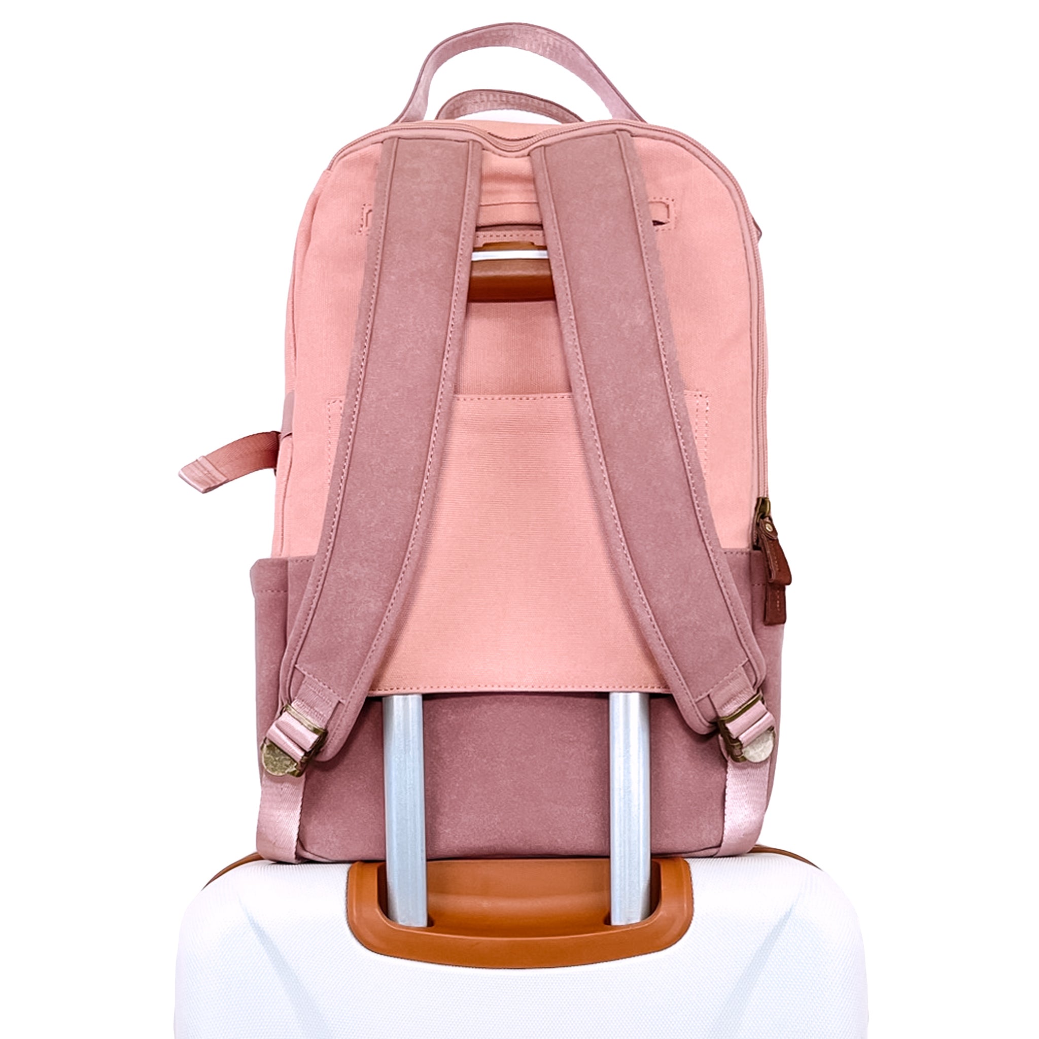 Stylish pink backpack with multiple pockets and a sleek design, featuring a secret back pocket and dedicated laptop compartment.