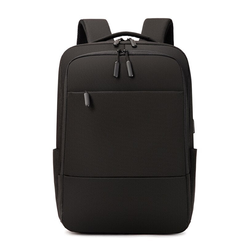 USB Charging Backpack for Men, waterproof and multifunctional with stylish patchwork design, featuring multiple pockets and USB charging port.