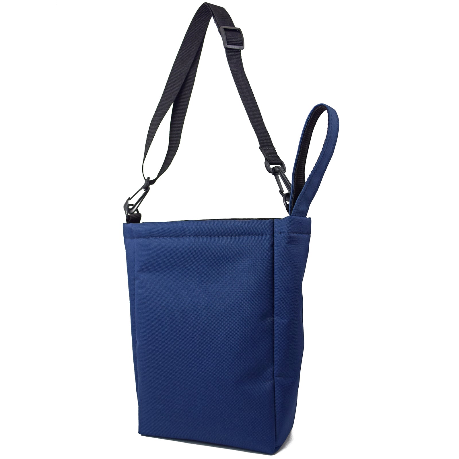 Navy Blue UTILITY Pouch Grab Bag showcasing its compact design and padded interior for carrying essentials.