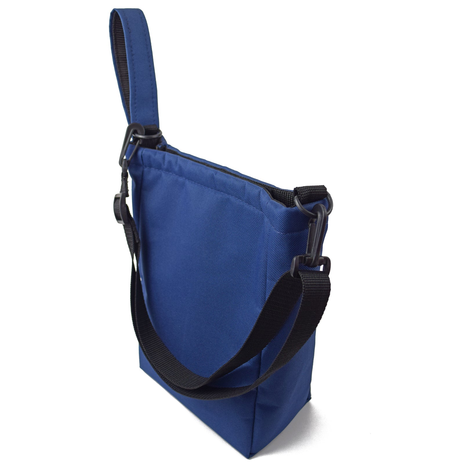 Navy Blue UTILITY Pouch Grab Bag showcasing its compact design and padded interior for carrying essentials.