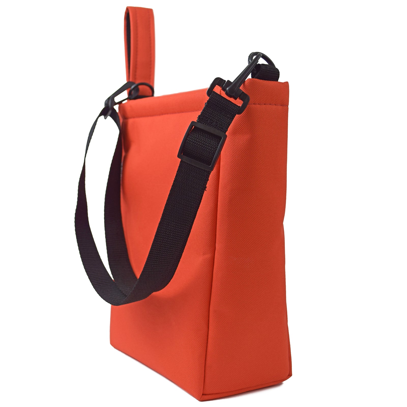 Bright orange UTILITY Pouch Grab Bag with cushioned interior and adjustable straps, ideal for organizing small items.