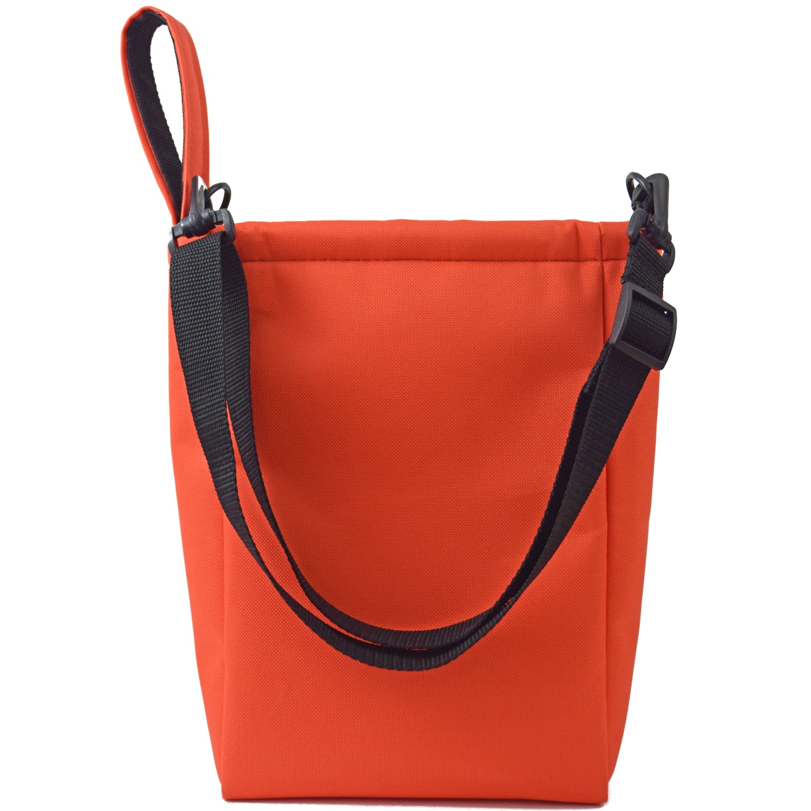 Bright orange UTILITY Pouch Grab Bag with cushioned interior and adjustable straps, ideal for organizing small items.