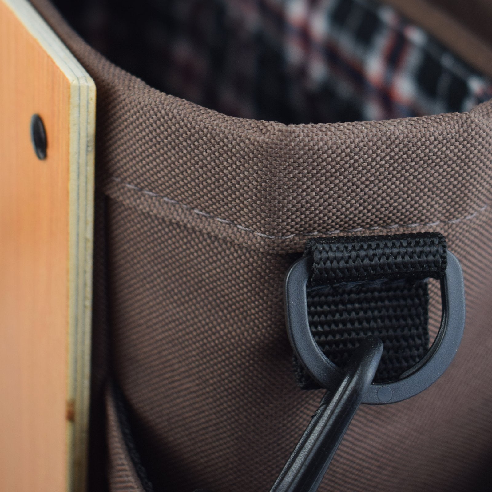 Woodsack Mini Backpack in brown, showcasing its compact design and stylish appearance.