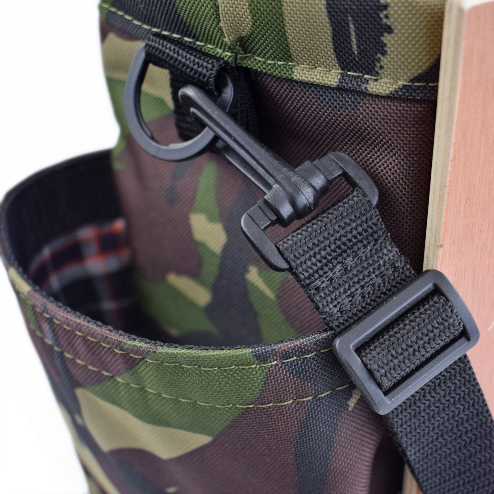 Woodsack Mini Backpack in CAMO SLAM design, showcasing its compact size and stylish camo pattern, perfect for daily use and travel.