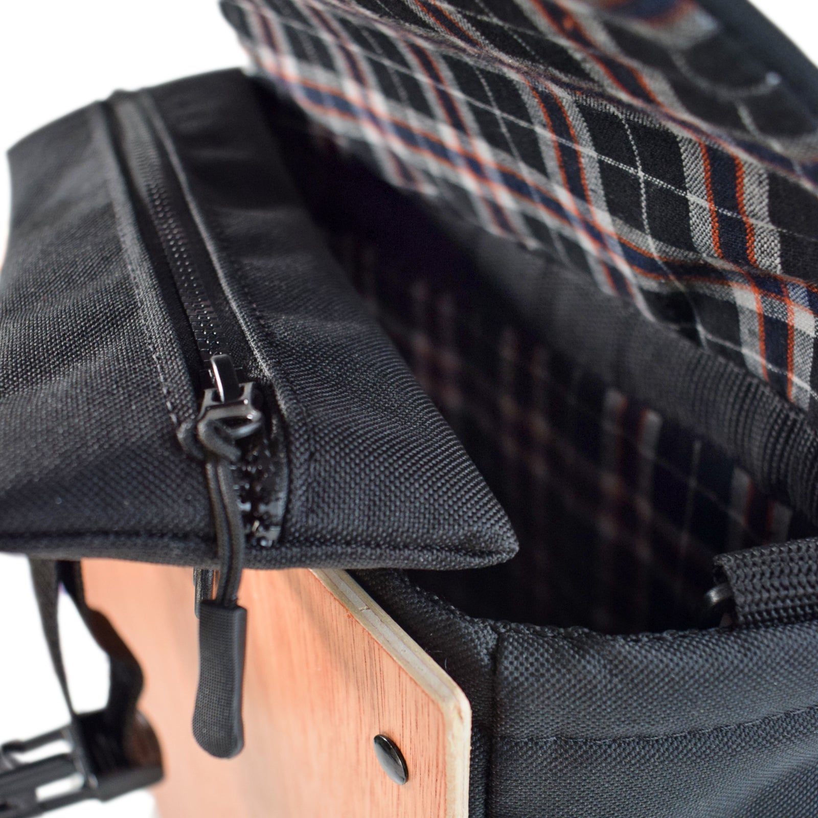 Woodsack Slim Backpack in BLACK showcasing its sleek design and minimalist style, perfect for carrying essentials.