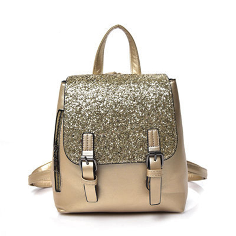 A stylish Women's PU Leather Sequined Backpack featuring a square vertical design, magnetic button closure, and a soft surface texture.