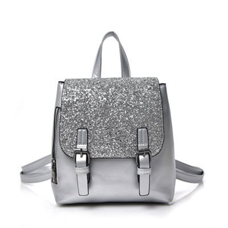 A stylish Women's PU Leather Sequined Backpack featuring a square vertical design, magnetic button closure, and a soft surface texture.