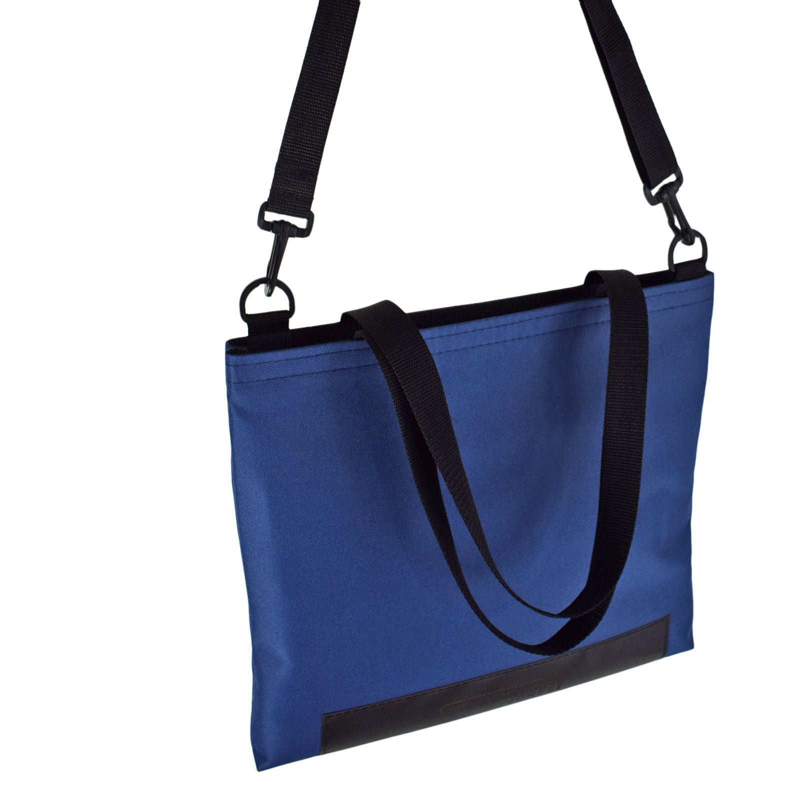 Navy blue WORK Tote Bag showcasing its compact and durable design, perfect for everyday use.