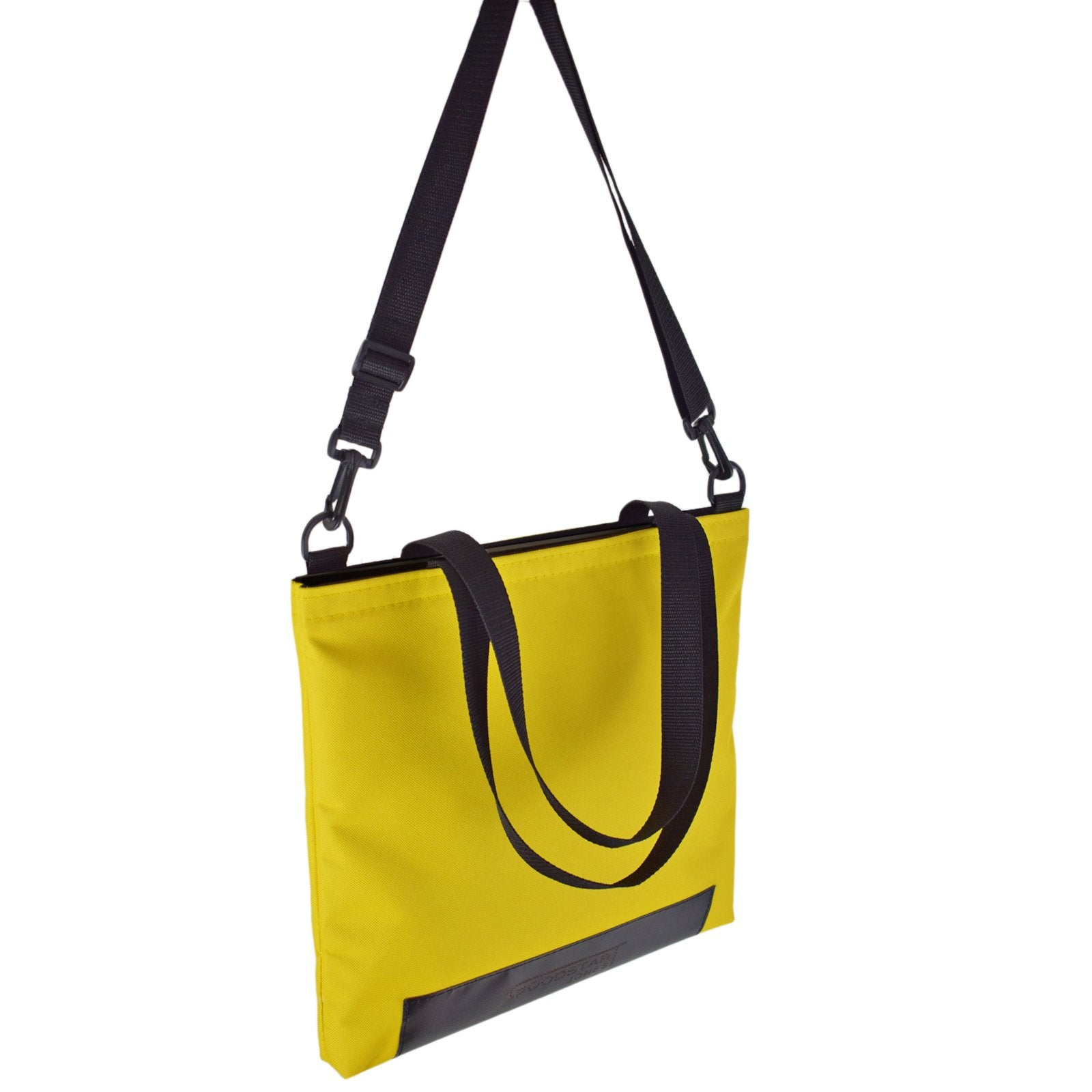 WORK Tote Bag in vibrant yellow, showcasing its compact and stylish design, perfect for everyday use.